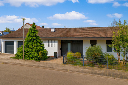 Großzügiger Bungalow mit Wintergarten, sonnigem Garten & zwei Garagen 5 zimmer