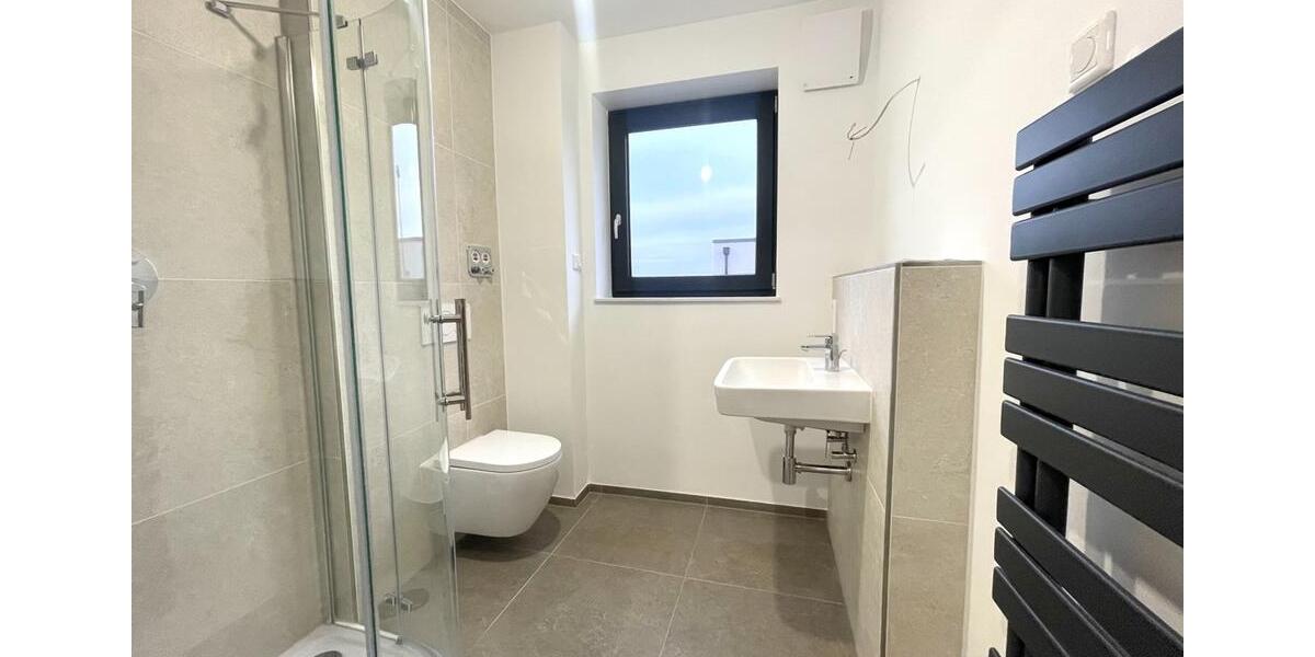 Zwischen Reben und Rhein - ERSTBEZUG! Exklusive 3-Zimmer-Neubauwohnung mit Balkon & TG-Stellplatz 3 zimmer