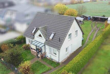 Familienfreundliches Haus mit großem Garten und verglaster Terrasse in idyllischer Feldrandlage 5 zimmer
