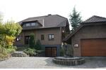 Freistehendes Einfamilienhaus im Landhausstil Massivbau