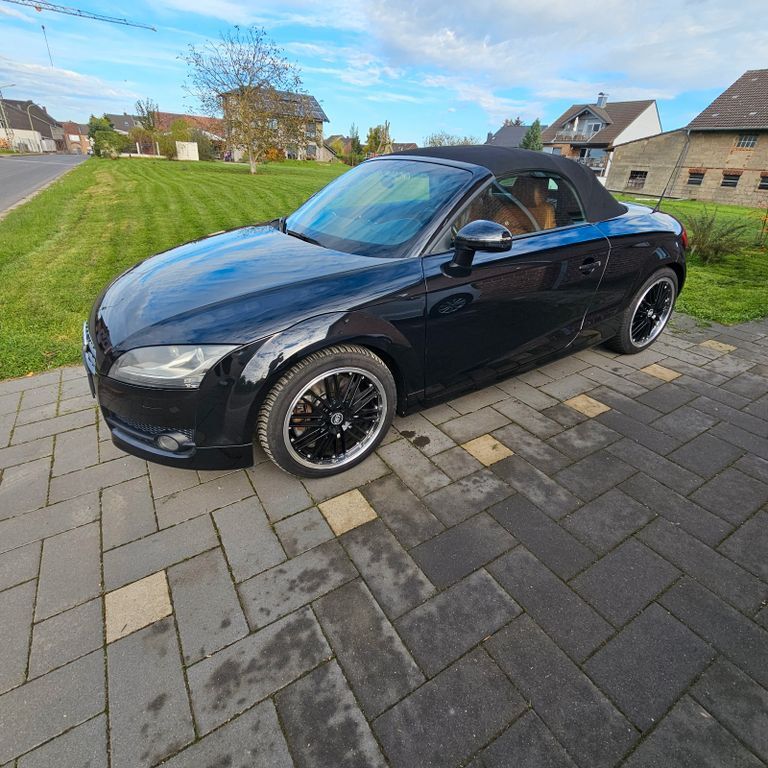 TT