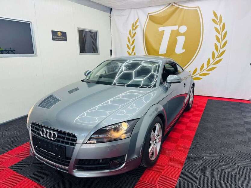 TT