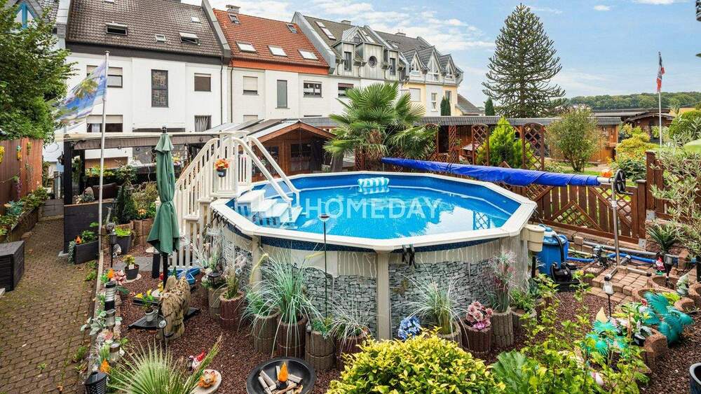 Zweifamilienhaus mit 210 m² Wohnfläche, Wintergärten, Loggia und gepflegtem Gartenparadies 1 zimmer