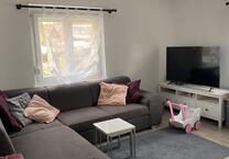 3-Zimmer, Erdgeschoss mit Einzelarage und Kaminofen