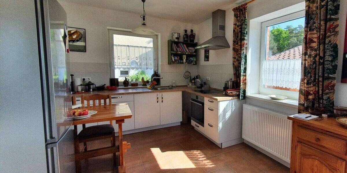 Neuwertiges EFH mit Wärmepumpe, Carport, 2 Bäder, EBK und eigenes Grünland - Einfamilienhaus Dömitz Heidhof | Angebot:26057443