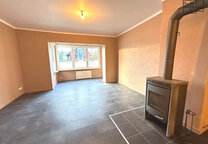 B&B Immobilien: Schöne 4-Zimmerwohnung mit Garten, Garage & Stellplätzen zu verkaufen