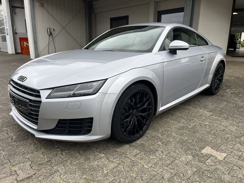 TT