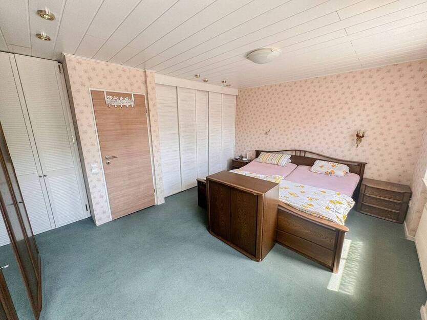 Familienfreundliches Reihenmittelhaus mit Tiefgarage und Garten in ruhiger Lage von Scherpenseel