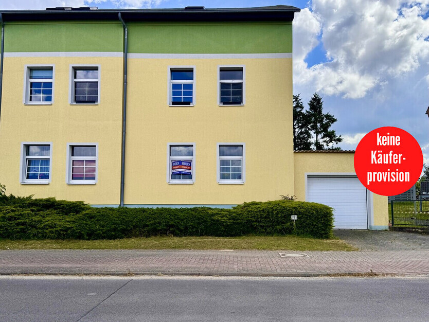HORN ImmobilieN ++ Erdgeschoss Eigentumswohnung mit Terrasse, Garten, Garage und Stellplatz