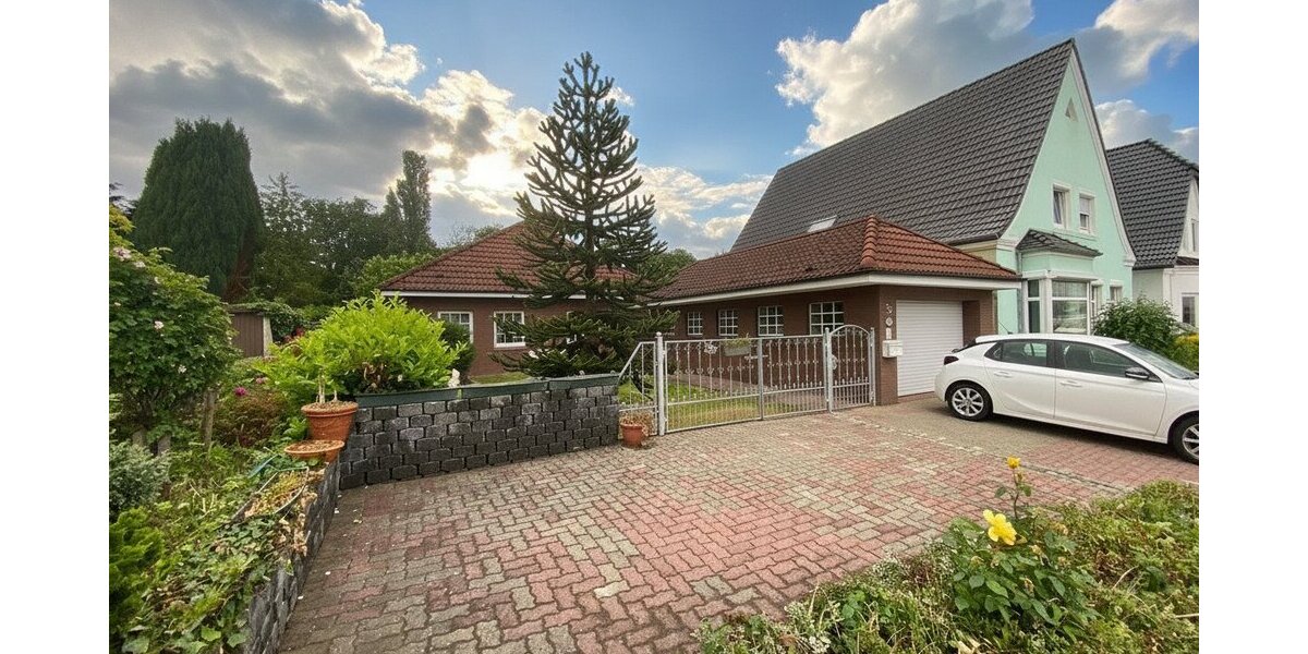 Walmdachbungalow in Marne - Stilvolles Wohnen mit Gartenblick und Wintergarten! - Bungalow Marne | Angebot:26835885