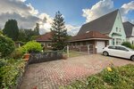 Walmdachbungalow in Marne - Stilvolles Wohnen mit Gartenblick und Wintergarten! - Bungalow Marne | Angebot:26835885