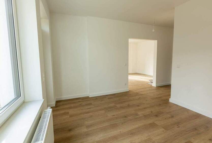 Helle 4-Zimmer-Wohnung mit kleinem Garten und Stellplatz – Erstbezug nach Sanierung