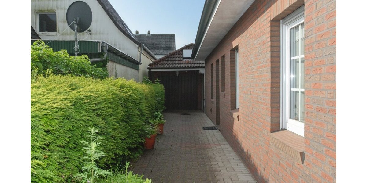 Walmdachbungalow in Marne - Stilvolles Wohnen mit Gartenblick und Wintergarten! - Bungalow Marne | Angebot:26835885