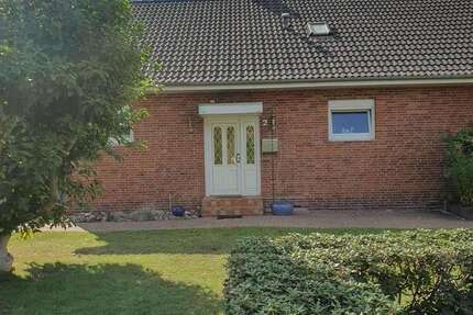 Haus zum Kaufen in Bad Zwischenahn 450.000 € 210 m² 7 zimmer