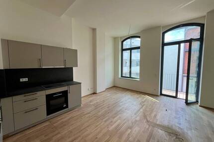 Sie suchen das Besondere? 2-Zimmer-LoftWohnung mit Balkon zum Erstbezug!