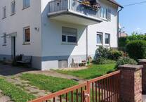 3,5 Zimmerwohnung mit großem Gartenanteil + extra Zimmer im UG + Garage