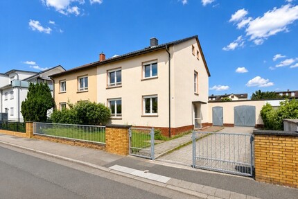 Doppelhaushälfte mit zwei Wohneinheiten und großem Grundstück in Dreieich-Sprendlingen - Haus Dreieich | Angebot:27053365