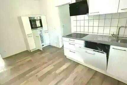 2,5-Zimmer-Wohnung im Erdgeschoss Einbauküche Dusche kein Balkon Kellerraum und Abstellraum Gartenanteil 2 zimmer