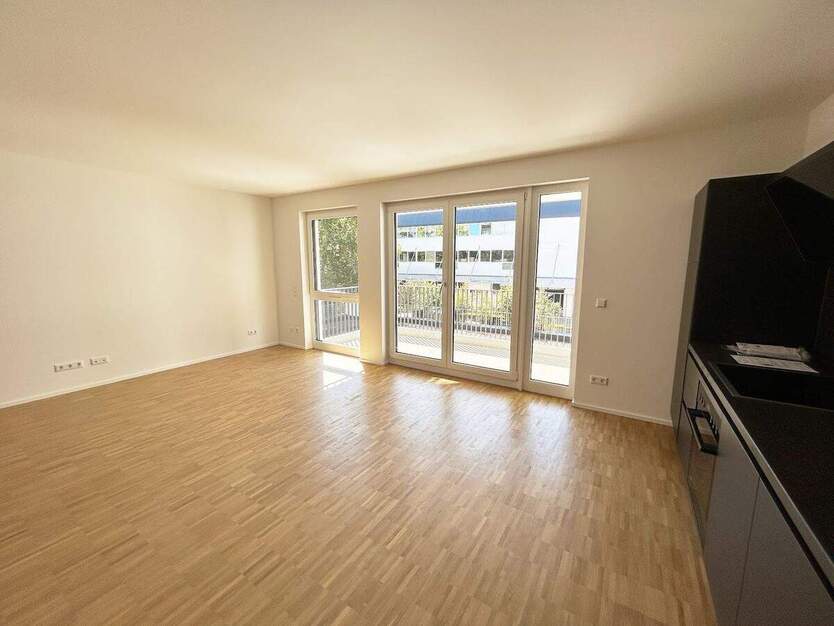 Viel Platz + moderner Neubaukomfort mit zwei Balkonen: Helle, große Zimmer, Einbauküche 2 zimmer