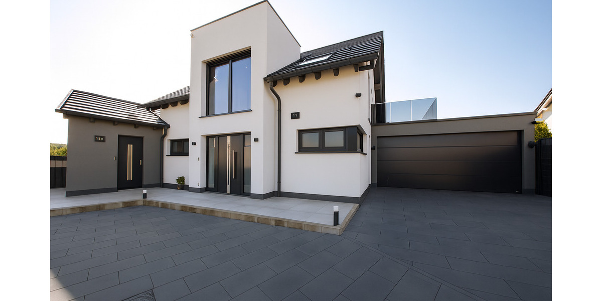 Familienidyll am Feldrand: KfW-40+ Traumhaus mit großem Südwest-Garten und Einliegerwohnung 6 zimmer