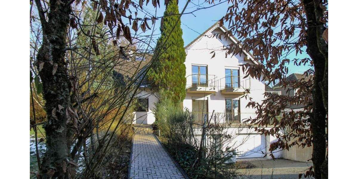 Aufgeteiltes Wohn- und Bürohaus in Sackgassenlage mit Tiefgarage und großem Naturgarten 1 zimmer