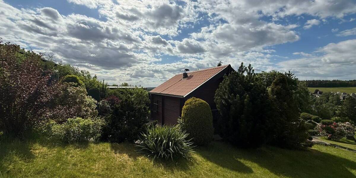 Ferienhaus mit Kamin, Einbauküche & Garage: Holz-Wochenendhaus im Grünen von Chemnitz-Harthau zimmer