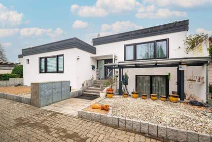 Architekten-Bungalow mit Atriumgarten, Wellnessbereich & hochwertiger Massivbauweise 6 zimmer