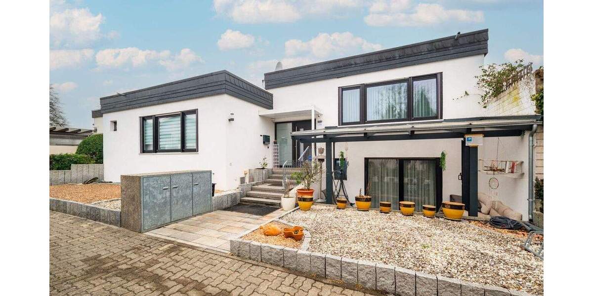 Architekten-Bungalow mit Atriumgarten, Wellnessbereich & hochwertiger Massivbauweise 6 zimmer