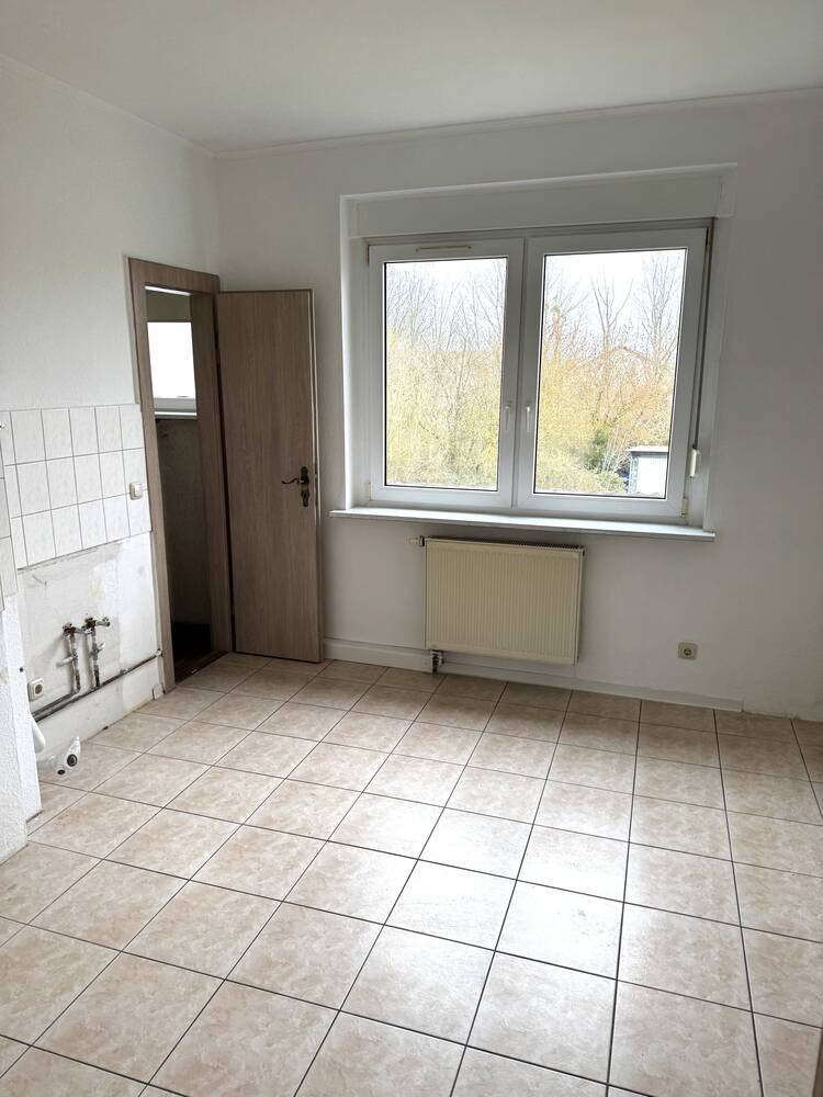 Schöne 3 Zimmer Wohnung im 1. OG mit ca. 86qm und Garten - frei ab sofort!