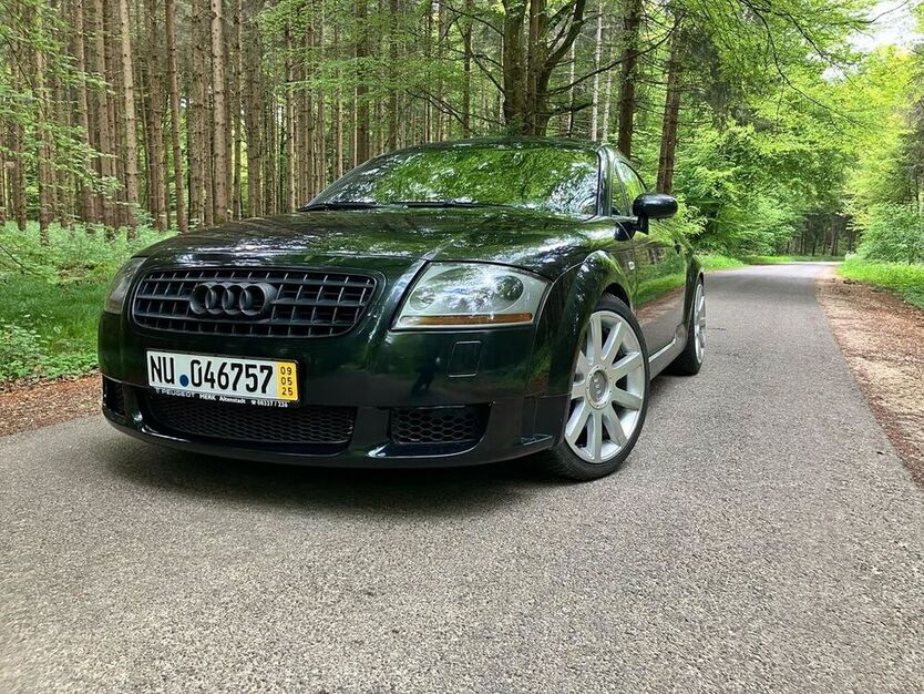 TT
