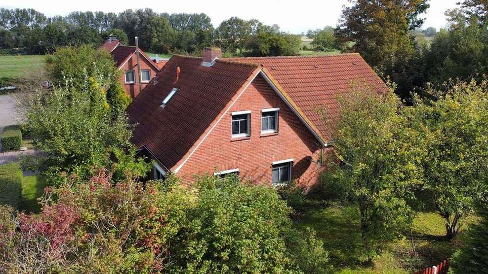 Haus zum Kaufen in Rysum 299.500 € 176 m²