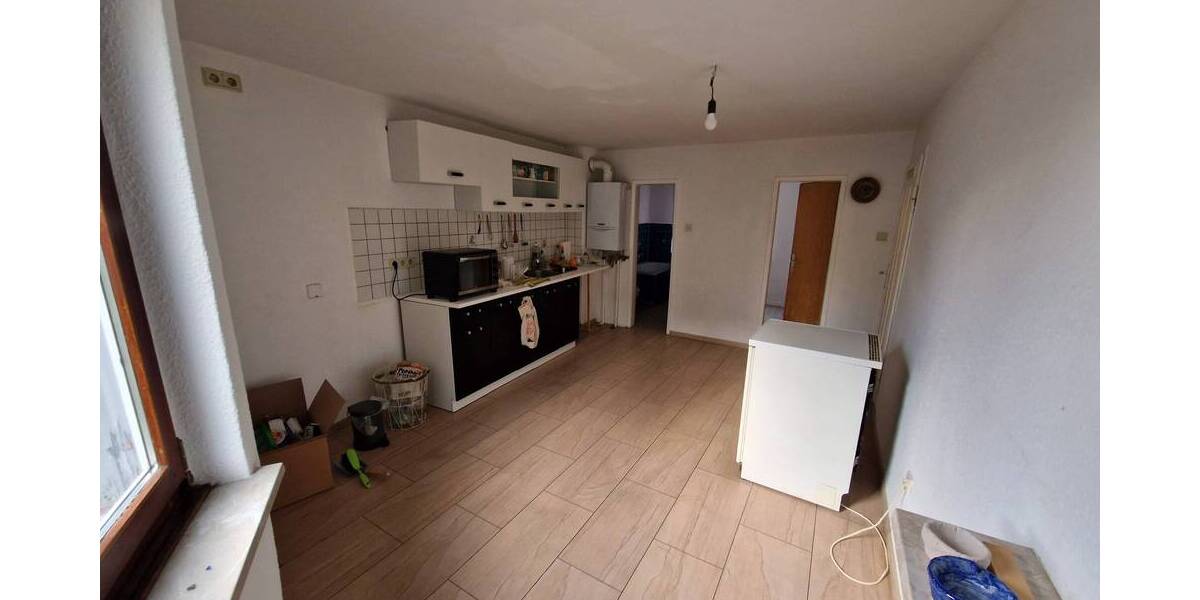 Mehrfamilienhaus mit Ladenlokal, Garagen und Garten zentral in Koblenz-Neuendorf 1 zimmer