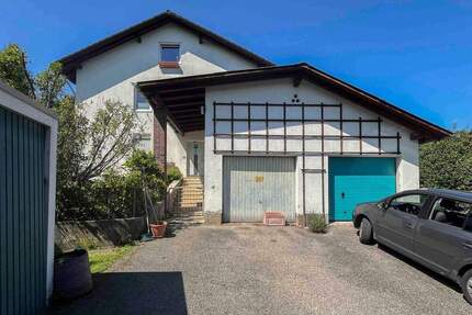 Mehrfamilienhaus mit 3 Einheiten und großem Garten in begehrter, familienfreundlicher Lage 9 zimmer