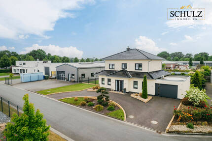 **Vielseitiges Anwesen mit luxuriösem Wohnkomfort und Gewerberaum in Cloppenburg!** 5 zimmer