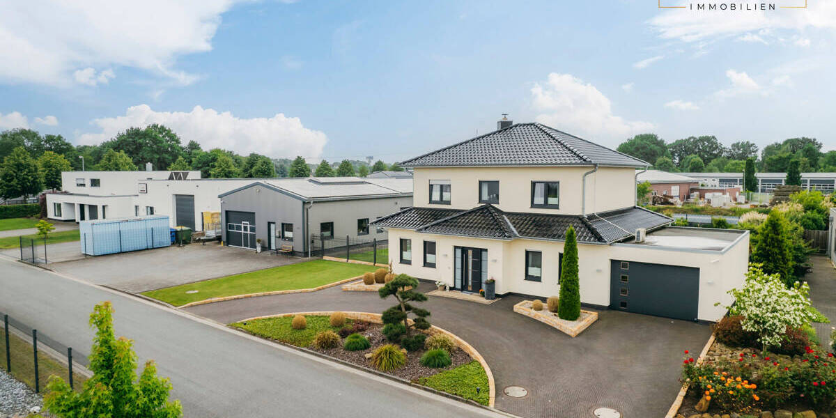 **Vielseitiges Anwesen mit luxuriösem Wohnkomfort und Gewerberaum in Cloppenburg!** 5 zimmer