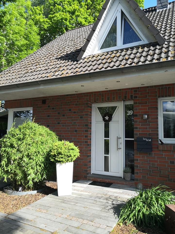 Doppelhaushälfte in Busnähe mit Ausbaupotenzial & Gartenparadies