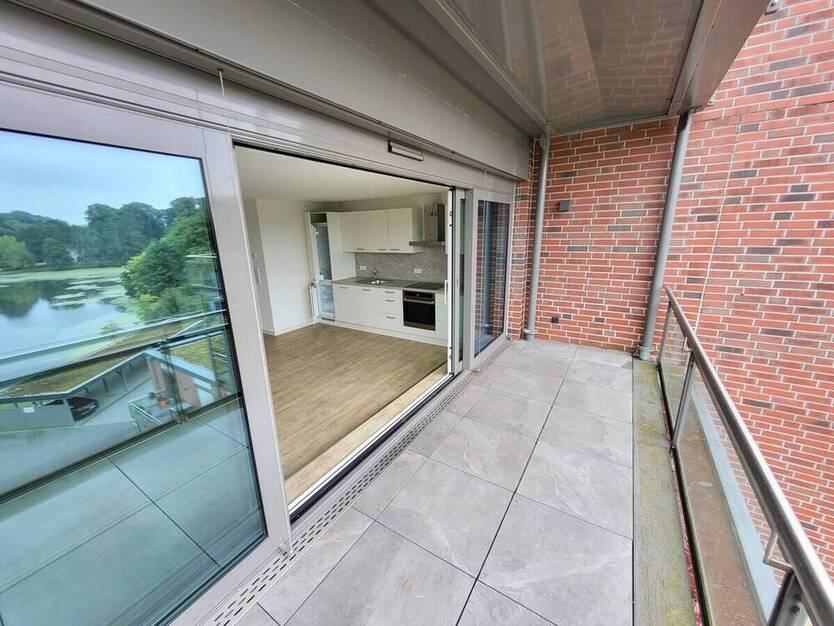 Exklusiv: Sanierte 3-Zi.-Wohnung mit Carport, Aufzug, Balkon & traumhaftem DOM-Blick am Mühlenteich