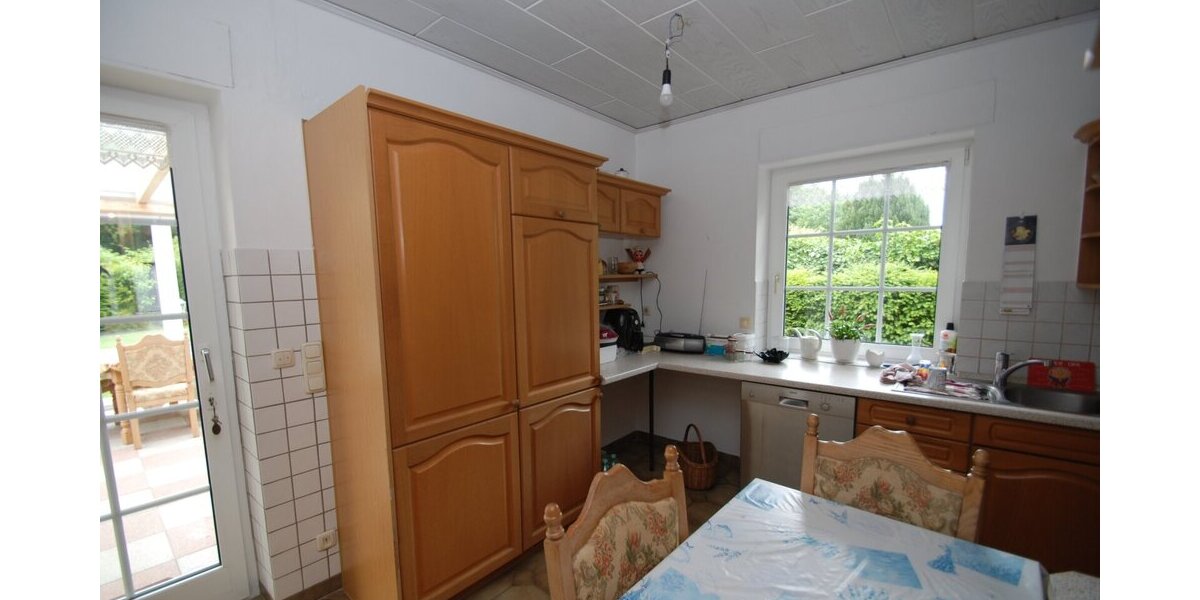 Walmdachbungalow in Marne - Stilvolles Wohnen mit Gartenblick und Wintergarten! - Bungalow Marne | Angebot:26835885