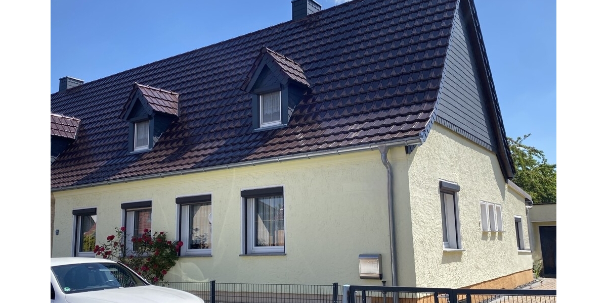Gemütliche Doppelhaushälfte mit großem Grundstück und Doppelgarage in ruhiger Siedlungslage - Doppelhaushälfte Röderaue | Angebot:27134387