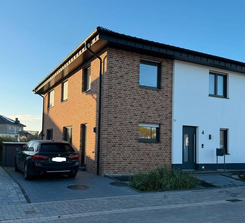 Moderne Doppelhaushälfte im Neubaugebiet mit Garten zimmer
