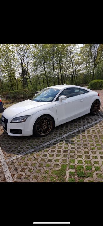 TT