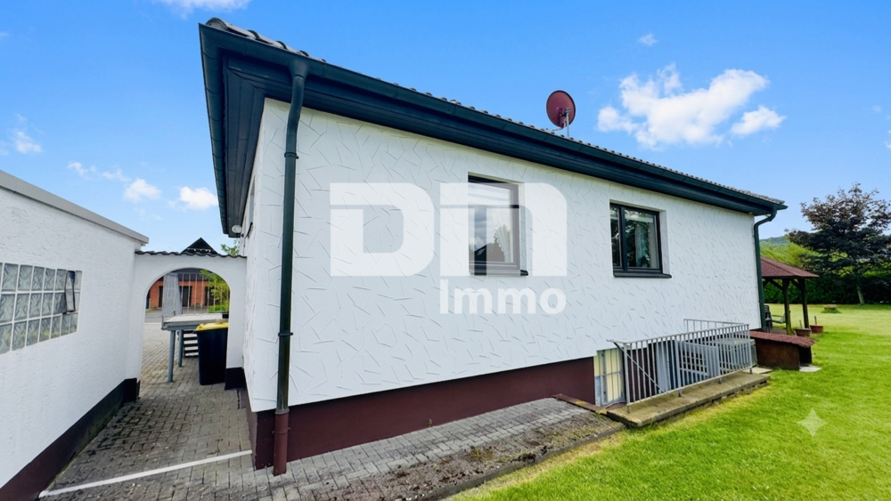 Solider Familien-Bungalow mit großem Potenzial in ruhiger Lage mit Wintergarten und Garage - Bungalow Calden | Angebot:26974963