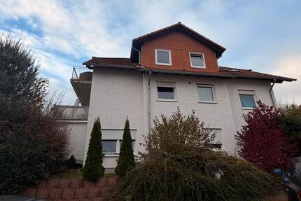 Gemütliche Dachgeschosswohnung mit Balkon und schönem Ausblick zimmer