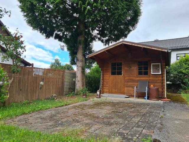 Gepflegtes freistehendes Einfamilienhaus mit großem Grundstück und 3 Garagen - Einfamilienhaus Bexbach | Angebot:26991721