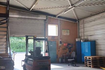 Gewerbeimmobilie mit Lager und Wohnung in 79423 Heitersheim zimmer