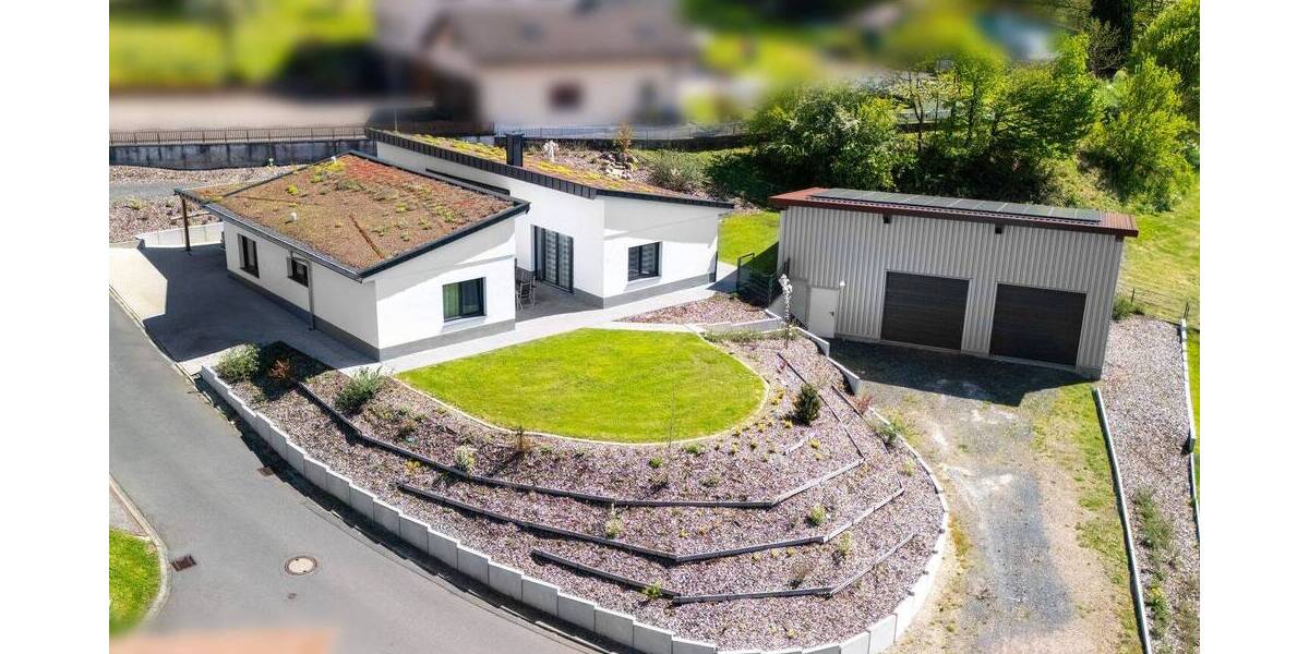 NEUER PREIS! Moderner Niedrigenergie-Bungalow (KfW 55) mit großer 3-fach-Garage in ruhiger Lage 4 zimmer