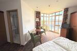 Voll möblierte 1-Zimmer-Wohnung mit Balkon zwischen See und Golfplatz