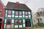 HORN IMMOBILIEN++ Friedland, historisches Stadthaus mit 6 Zimmern, Kaminöfen, 2 Bädern und Garage - Einfamilienhaus Friedland | Angebot:26181375