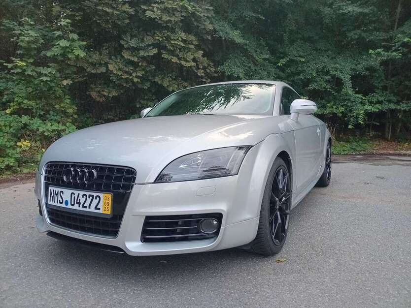 TT