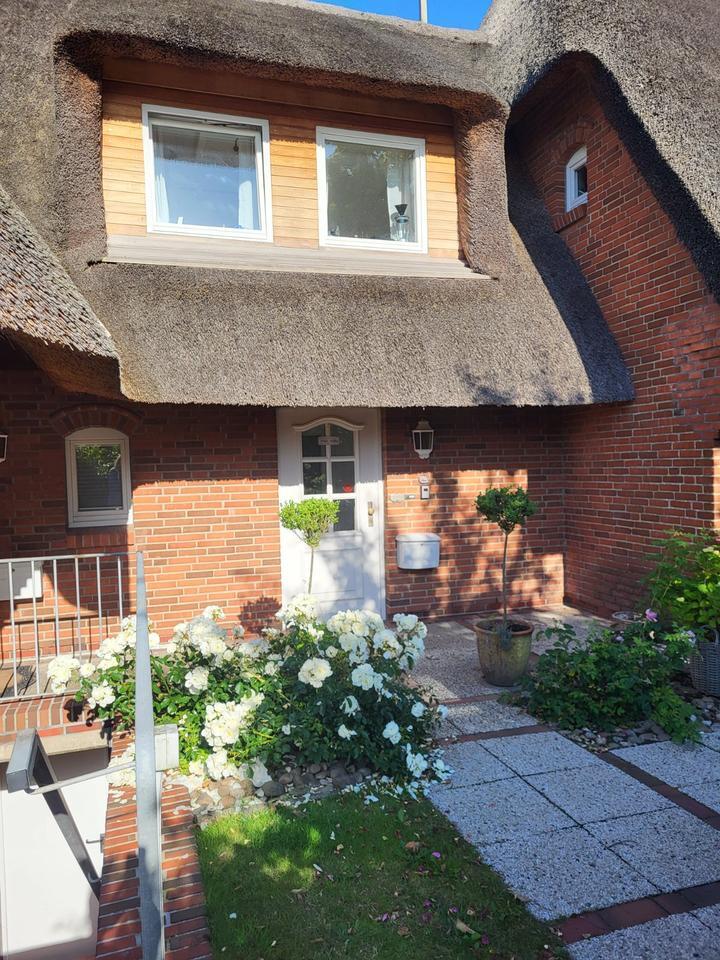 Schönes kleines Hausteil unter Reet mit Garten